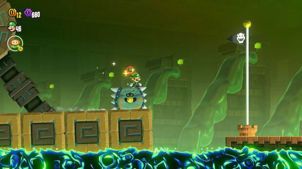 Super Mario Bros. Wonder - Cómo llegar a lo más alto del banderín de meta en Excavación central: Ruinas basculantes