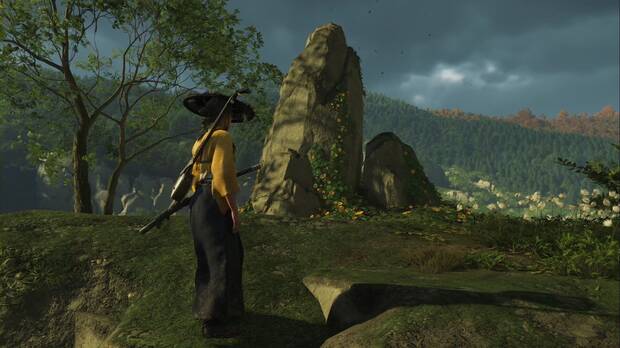 Ghost of Yotei - Rocas que sealan la posicin de una esterilla para pintar un sumi-e