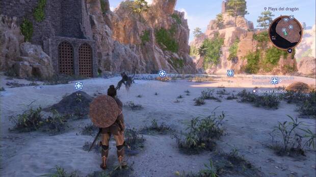 Dragon Age: The Veilguard - Kataranda el cabalgatormentas: Assan examina los montículos en la playa