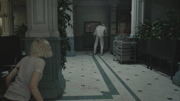 Resident Evil Requiem - Centro de pacientes (III), zombi armado en un lateral de la Sala de espera