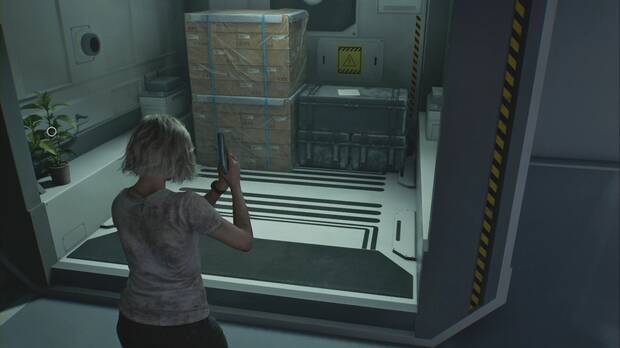 Resident Evil Requiem - ARK (II), ubicación del documento Caja fuerte de la sala de esterilización en la planta baja del Vestíbulo, en un hueco a la derecha del cruce según bajas