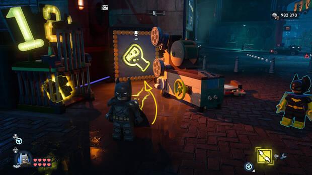 LEGO Batman: El Legado del Caballero Oscuro - C�mo resolver el puzle del acertijo de Cluemaster 01 en Gotham Village - Robinson Park