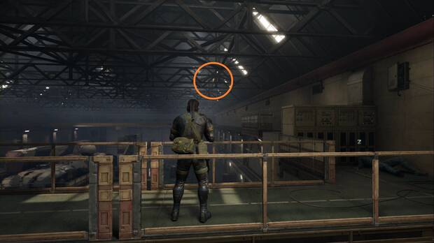 Metal Gear Solid Delta - Groznyj Grad: Segundo asalto, ubicacin del GA-KO #51 entre las vigas del techo del hangar