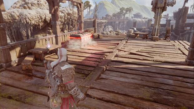 God of War Ragnarok - Hallazgos en Svartalfheim: Amanecer de la nada sobre un banco, a la izquierda de Kratos. Al fondo pueden verse un cofre con materiales y la segunda cadena que abre la puerta del curso del río