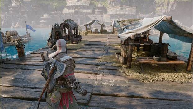God of War Ragnarok - Hallazgos en Nidavellir: ubicación de El orbte terrestre de la gran sociedad sobre una de las cajas del muelle en la zona bloqueada por obstácullos verdes resonantes