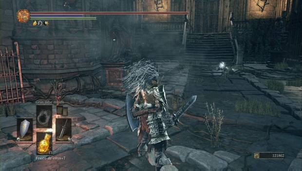 Dark Souls 3 - Gran Archivo: cadáver de la mano engra al pie del Gran Archivo
