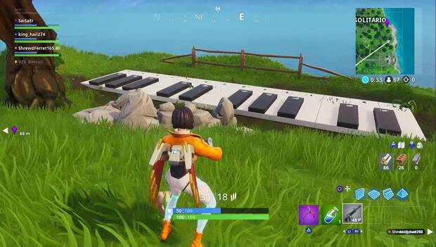 Fortnite Battle Royale - Visita un teléfono, un piano y un trofeo de pesca: trofeo de pesca