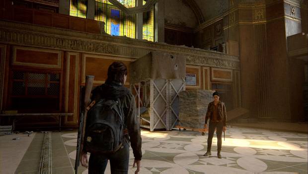 The Last of Us Parte II - Centro: carrito empujado contra las estanterías centrales