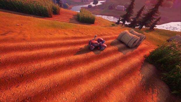 Fortnite - Busca pistas en la granja: pista junto al tractor de la Granja de acero