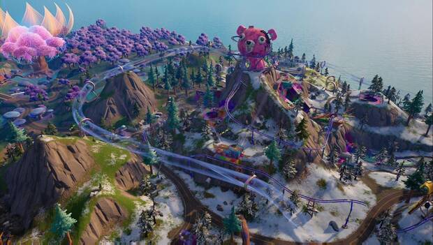 Fortnite Battle Royale - Novedades del Capítulo 3, Temporada 3: cumbre de la montaña sobre la Caverna Descontrol, donde puede verse la cabeza del líder del Equipo Arrumacos, los raíles para bolonchos y los túneles de viento