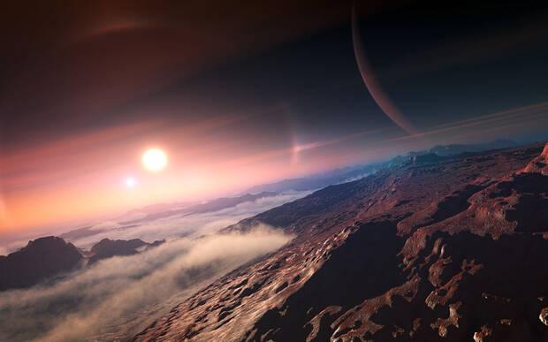 Representaci�n art�stica de un sistema exoplanetario visto desde una hipot�tica luna de uno de los exoplanetas del mismo sistema