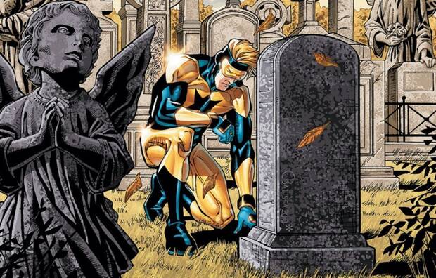 Booster Gold frente a la tumba de Blue Beetle