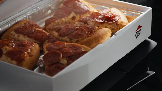 El accesorio m�s raro de PS5: Un calentador de pizza que aprovecha el calor que emana de la consola.