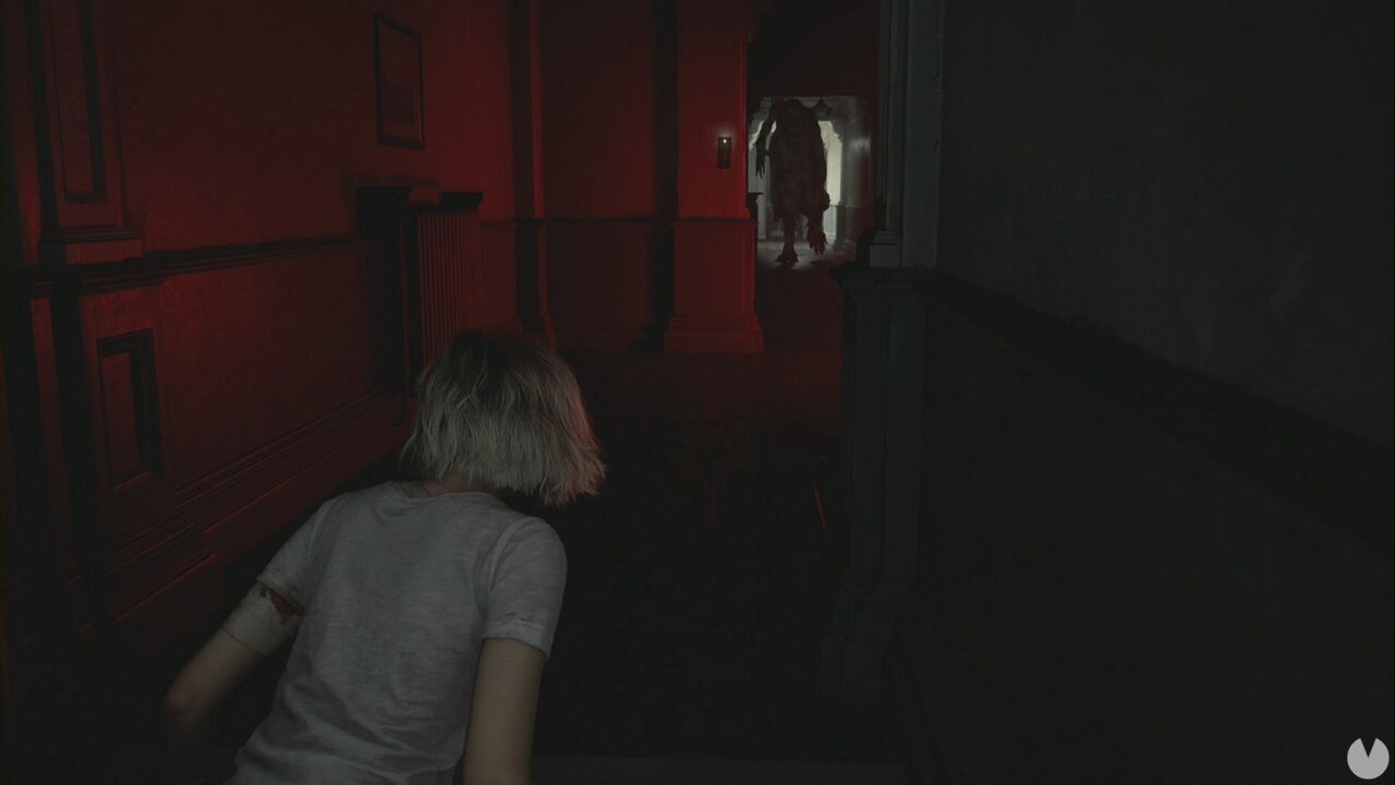 Resident Evil Requiem - Patient Center, the monster stalks Grace from the western hallway