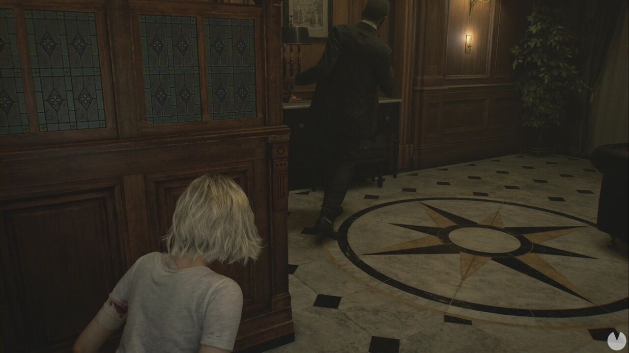 Resident Evil Requiem - Patient Center (III), infected enemy from the eastern side of the hallway north of the Kitchen heading to switch off the light on the western side