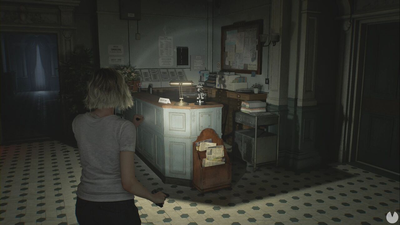Resident Evil Requiem - Mr. Raccoon in Patient Center (III), figure on the reception desk in the ground-floor East Wing Hall