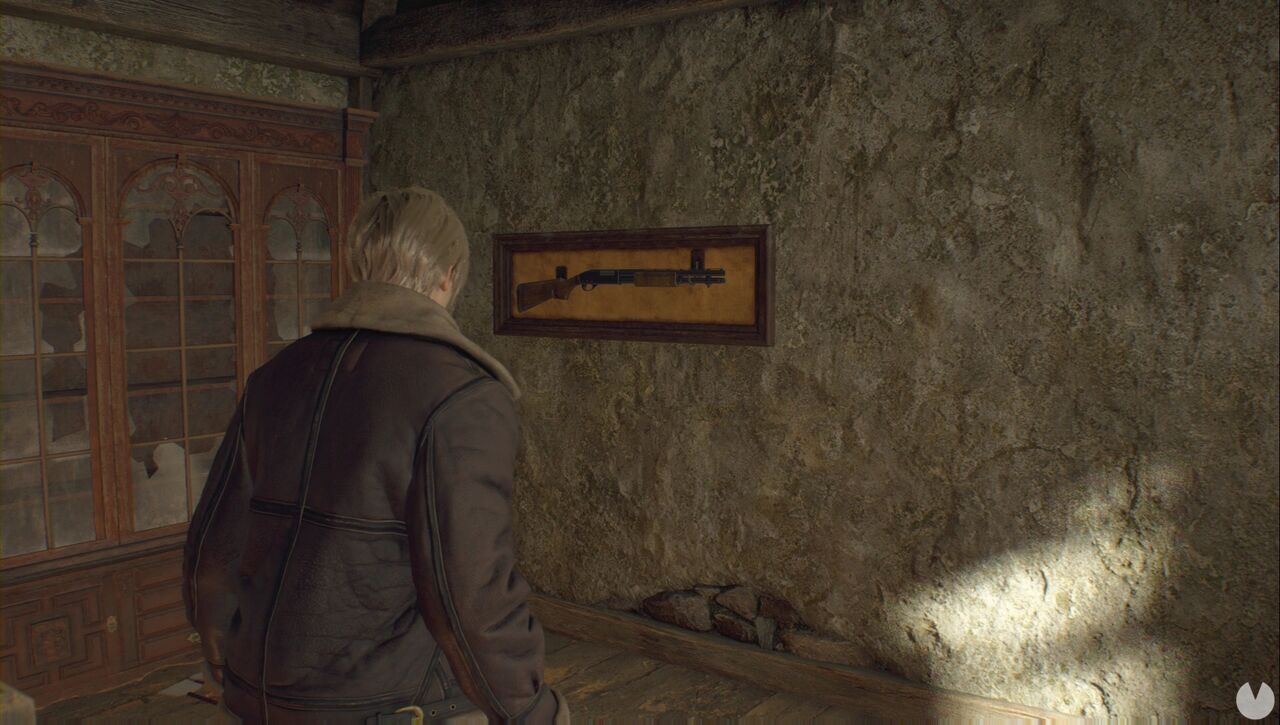 Resident Evil 4 Remake - Chapter 1: Shotgun hanging on the wall inside the house